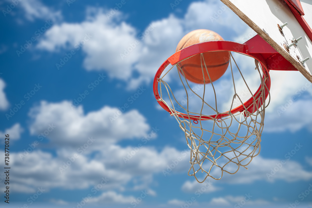 Basketball hoop on blue sky background Basketball hoop on blue sky background