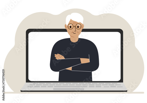 Man communicates via videoconference through laptop screen. The concept of online meetings, webinars, remote work or work from home.