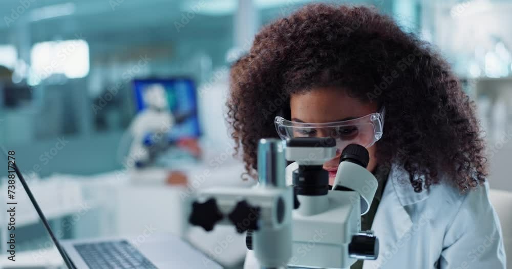 Scientist, woman and microscope with computer for laboratory research, test and DNA investigation at night. Professional doctor or science expert with lens check, laptop and particles for inspection