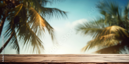 Wooden table top on blurred background of palm trees and sea  copy space. Wood floor top on summer tropical beach background  Advertisement  Illustration  Banner  copy space