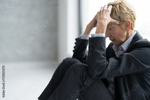 Wallpaper Mural Frustrated businesswoman holding her head Torontodigital.ca