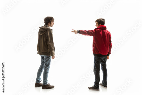 Young man in red jacket pointing finger at another man in a confrontation on white background