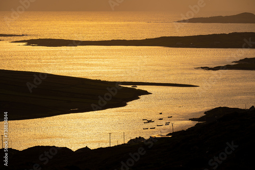Sunset view of Ardmore and Turbot islands from famous scenic Sky Road, 15km looped drive starting in Clifden with numerous brilliant viewing points, Wild Atlantic Way, Connemara, Ireland. photo