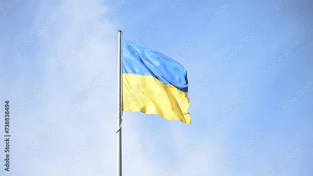 The Ukrainian blue-yellow flag flutters in the wind The Ukrainian blue-yellow flag flutters in the wind
