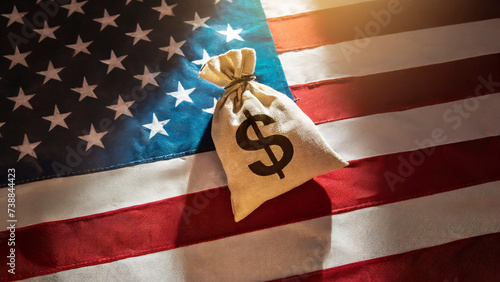 Money bag with dollar sign on the background of the US flag. American economy concept. Investment and success  © Mariusz Blach
