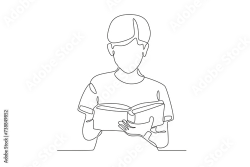 A boy is reading a short story