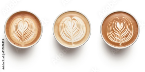 Set of paper takeaway cups of different latte art isolated on a white background, top view