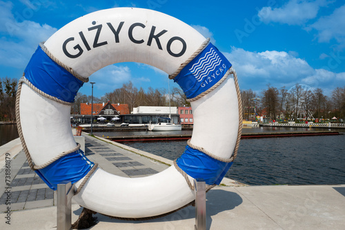 Fototapeta Naklejka Na Ścianę i Meble -  2023-04-18 embankment with the symbol of the city Gizycko Poland