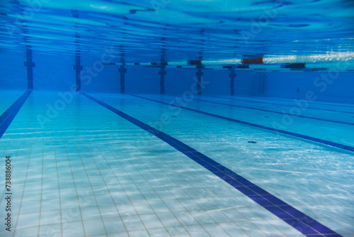 Empty sports swimming pool, underwater photo.