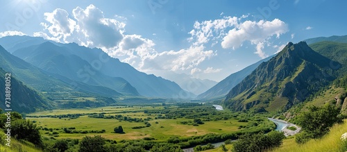 view of mountains and rivers during summer on a sunny day.