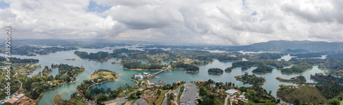 Panoramic view of the man-made Peñol-Guatapé Reservoir with its many small islands and bays and the town of Guatapé in Colombia.