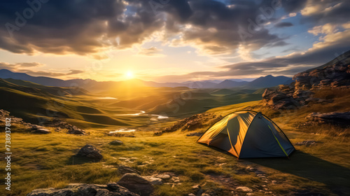 Experience natures tranquility while camping in the mountains. A picturesque sunset frames the serene landscape, perfect for outdoor enthusiasts.