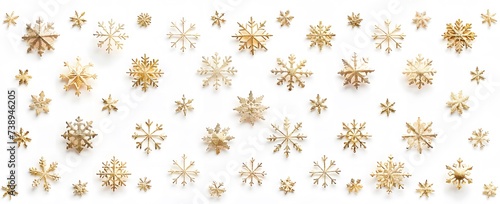 set of gold snowflakes on white background
