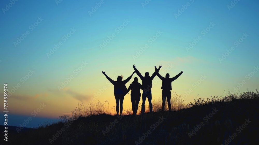 A picturesque scene of camaraderie as silhouettes stand atop a desert hill, bathed in the warm glow of a setting sun, their outstretched arms reaching for the vast sky above while the rugged mountain