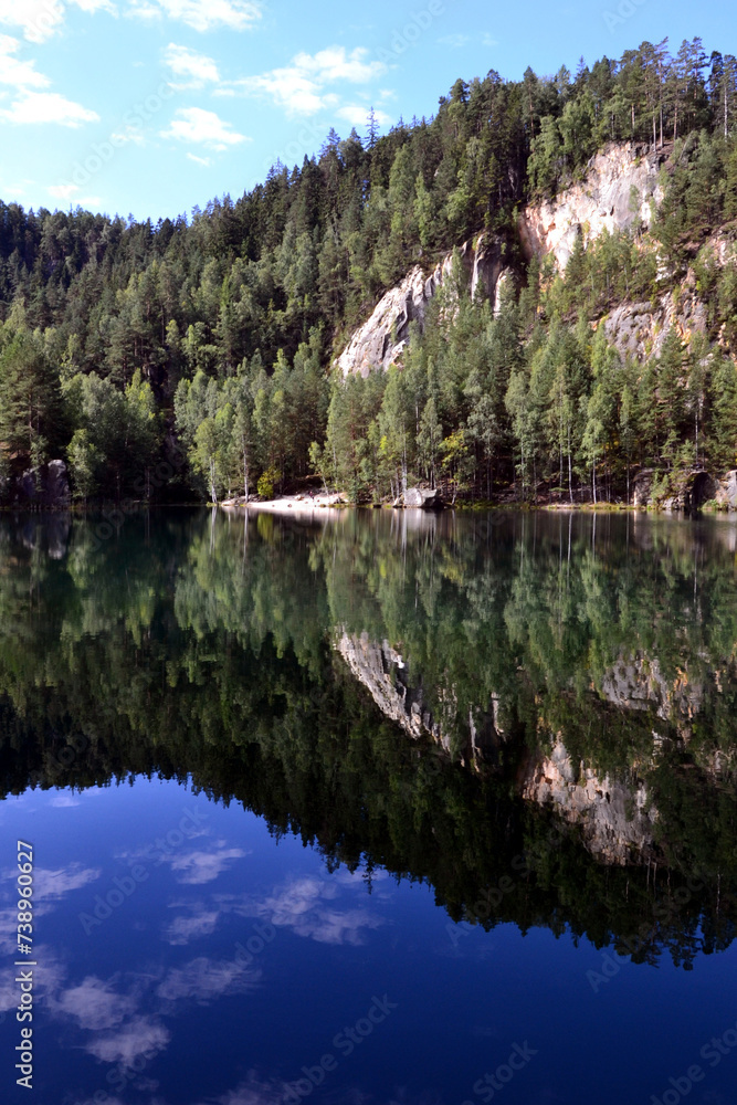Rock city in Adrspach, Czech Republic. Quarry lake in Adrspach-Teplice Rocks Nature Park Rock city in Adrspach, Czech Republic. Quarry lake in Adrspach-Teplice Rocks Nature Park