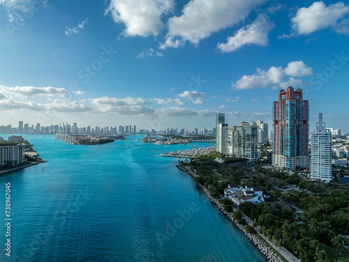Aerial view of turquoise water of Government cut, busy waterway connecting the ocean to Miami cruise port, Fisher Island, South Beach  © tamas