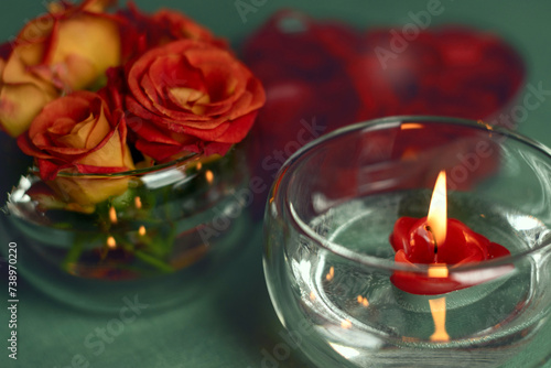 Bouquet of roses, candles and gifts, card for February 14, Valentine's Day, March 8, International Women's Day, wedding, birthday, mother's day, blurred background, bokeh.