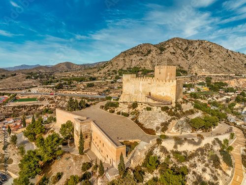Aerial view of Petrer, medieval town and hilltop castle with restored tower and battlements near Elda Spain, photo