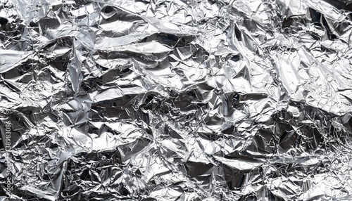 Texture of crumpled silver foil. Close up, concept for design or background