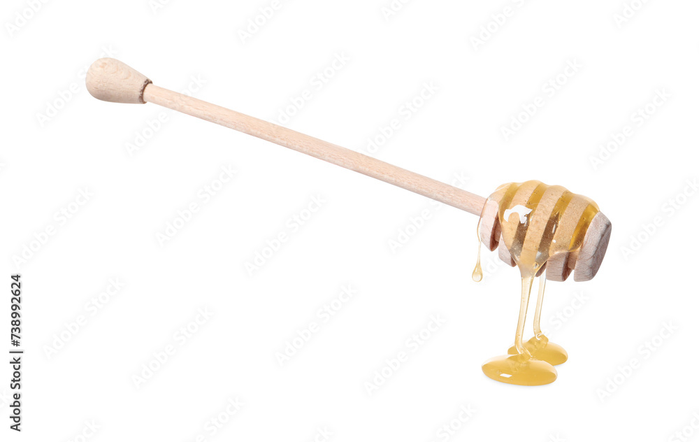 Natural honey dripping from dipper on white background Natural honey dripping from dipper on white background