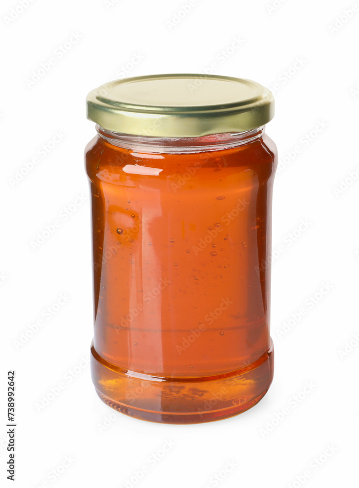Tasty natural honey in glass jar isolated on white Tasty natural honey in glass jar isolated on white