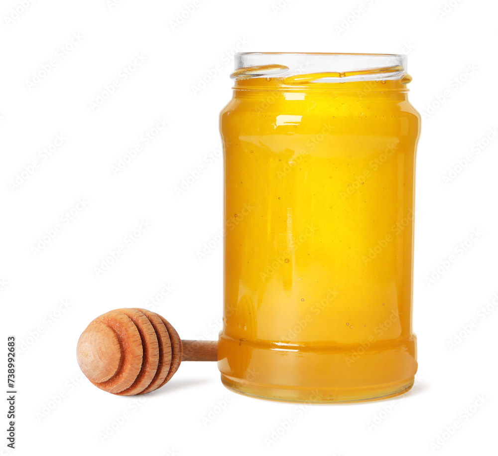 Tasty natural honey in glass jar and dipper isolated on white Tasty natural honey in glass jar and dipper isolated on white