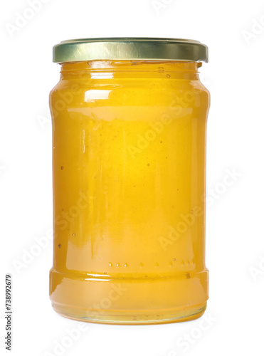 Tasty natural honey in glass jar isolated on white