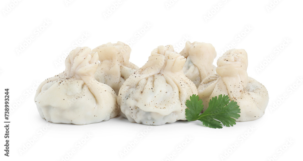 Tasty khinkali (dumplings) and spices isolated on white. Georgian cuisine Tasty khinkali (dumplings) and spices isolated on white. Georgian cuisine