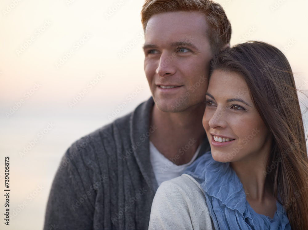 Couple, hug and thinking with love outdoor at sunset planning future holiday together in Florida. Travel, ideas and man with woman on beach, vacation or date in summer with support in marriage Couple, hug and thinking with love outdoor at sunset planning future holiday together in Florida. Travel, ideas and man with woman on beach, vacation or date in summer with support in marriage
