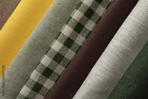 Many different fabrics as background, closeup view