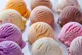A set of scoops of different ice creams. Background with selective focus and copy space