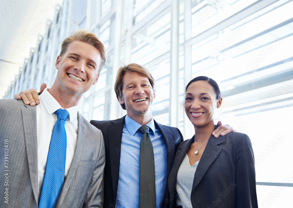 Business people, portrait and confidence in unity, embrace and together in partnership. Happy coworkers, teamwork and collaboration or support in workplace, professionals and hugging for solidarity Business people, portrait and confidence in unity, embrace and together in partnership. Happy coworkers, teamwork and collaboration or support in workplace, professionals and hugging for solidarity