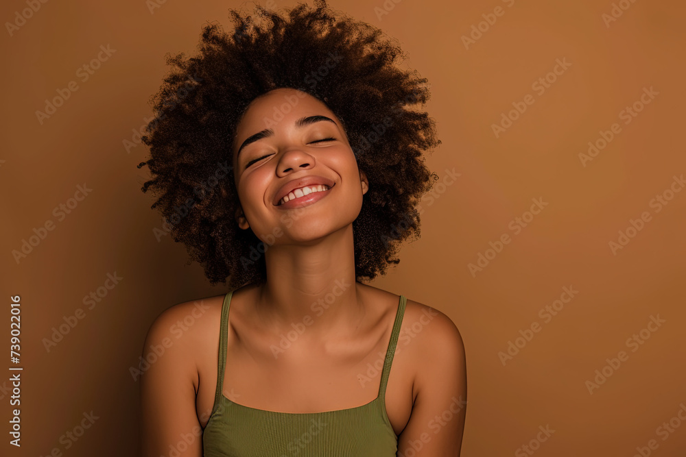 Cute Teen Girl Smiling in Green Top with Brown Background
Cute Teen Girl Smiling in Green Top with Brown Background