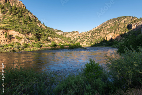 In a summer morning, the Colorado river in the Glenwood Canyon, White River National Forest (Glenwood Springs, Colorado, United-States)