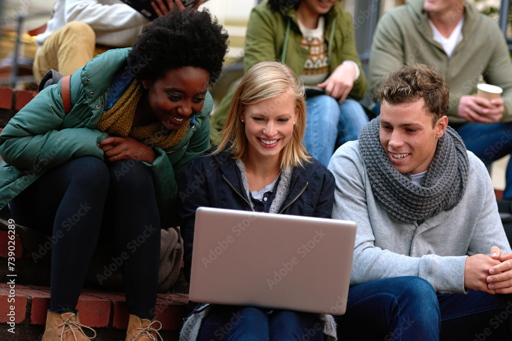 College, students and laptop on stairs outdoor for research, relax or break on campus with social media. University, friends or smile with technology for internet, streaming or learning and diversity College, students and laptop on stairs outdoor for research, relax or break on campus with social media. University, friends or smile with technology for internet, streaming or learning and diversity