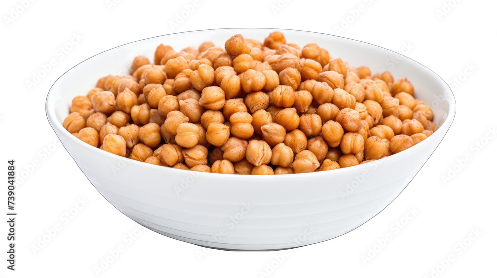 A white bowl filled with roasted chickpeas sits on a black surface. A white bowl filled with roasted chickpeas sits on a black surface.