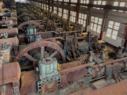 Photos Interior image of the long factory floor with the heavy equipment and machinery