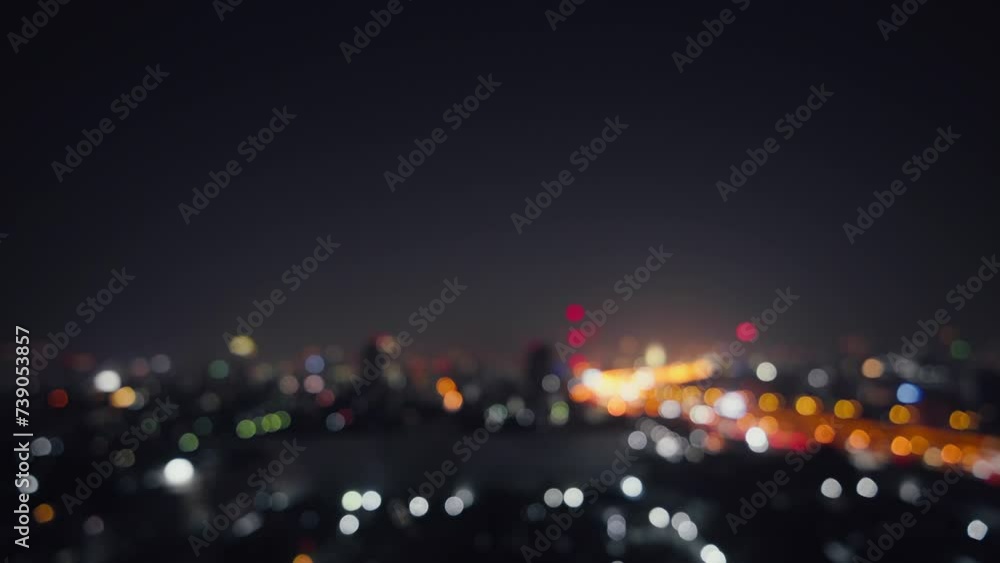 Blurred of night city skyscraper and tower lights bokeh , Soft Focus , Metropolis Backgound wallpaper for movie or documentary romantic mood concept