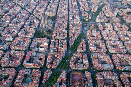 Aerial wide angle view of Barcelona Eixample residencial district with typical urban grid, Spain