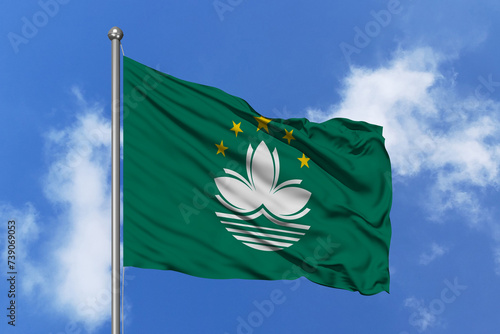 Macau flag fluttering in the wind on sky.