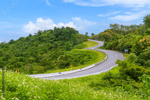 Famous S-curve or 3 shape road curve on highway number 1081 from Pua to Bo Kluea district, Nan province, Thailand photo