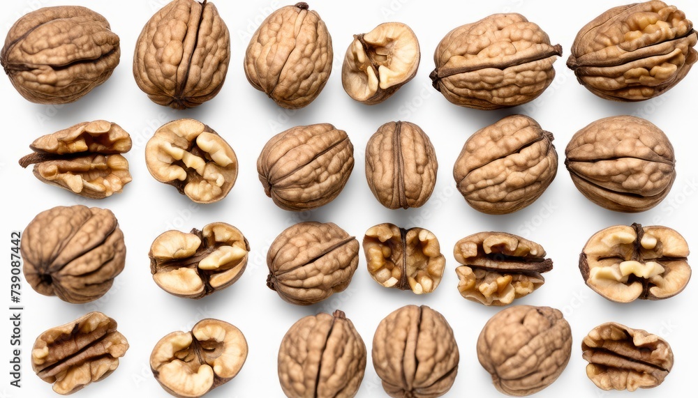 A collection of walnuts, both whole and cracked, showcasing their intricate interiors A collection of walnuts, both whole and cracked, showcasing their intricate interiors