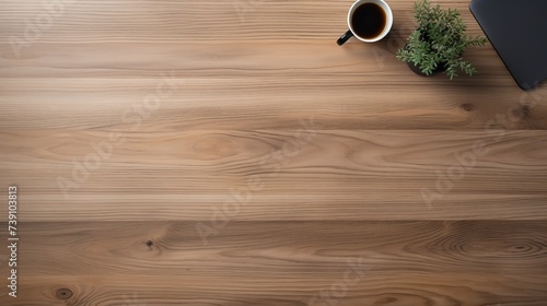 Wooden work desk top view with copyspace in the middle