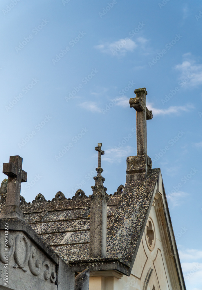 Cross on the old mausoleum in the cemetery