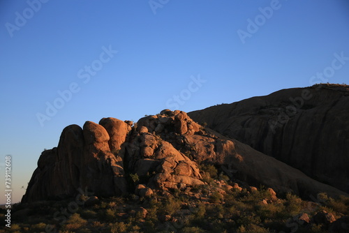 giant red cliffs of Erongo mountains at sunset