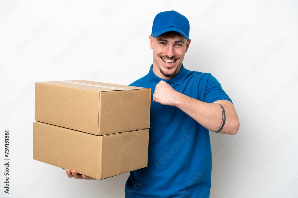 Delivery caucasian man isolated on white background celebrating a victory Delivery caucasian man isolated on white background celebrating a victory