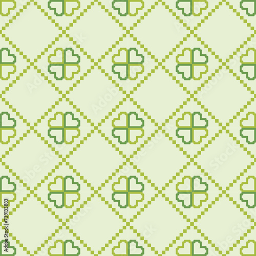 Seamless pattern clover leaves.Lucky magical plant. Background for St.Patrick's Day.Cute green shamrock four leaf. Irish Celtic folk.Pixel embroidery,ethnic,cross stitch style Vector illustration.