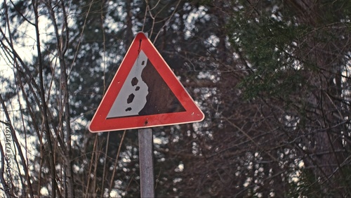 Falling Rocks Caution Road Sign