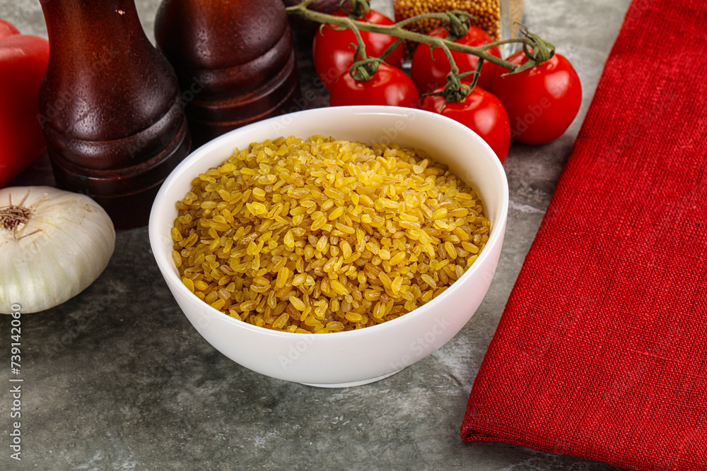 Dry wheat bulgur cereal heap Dry wheat bulgur cereal heap