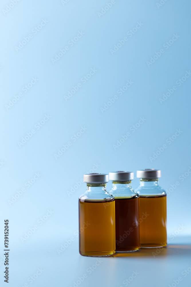 syringe for injectable medication on blue background syringe for injectable medication on blue background